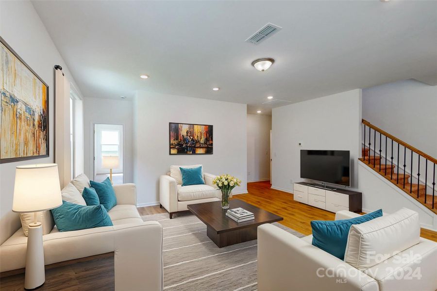 Family room shown with virtual staging