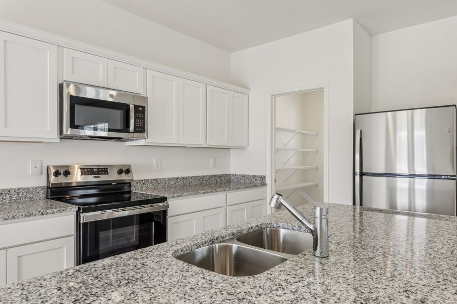 Representative furnished interior of a home built from the Neptune by Starlight Homes in Castlewood South, Taylor (Image 12). Representative furnished interior of a home built from the Neptune by Starlight Homes in Castlewood South, Taylor (Image 12).