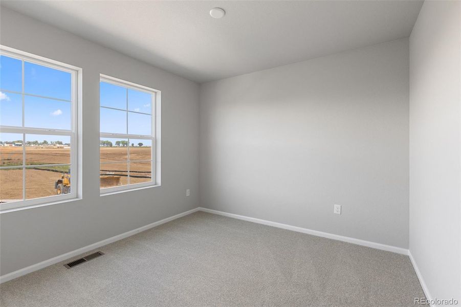 Spacious, unfurnished interior of a new home in The Legacy Collection at Talon Pointe, Thornton (Image 25).
