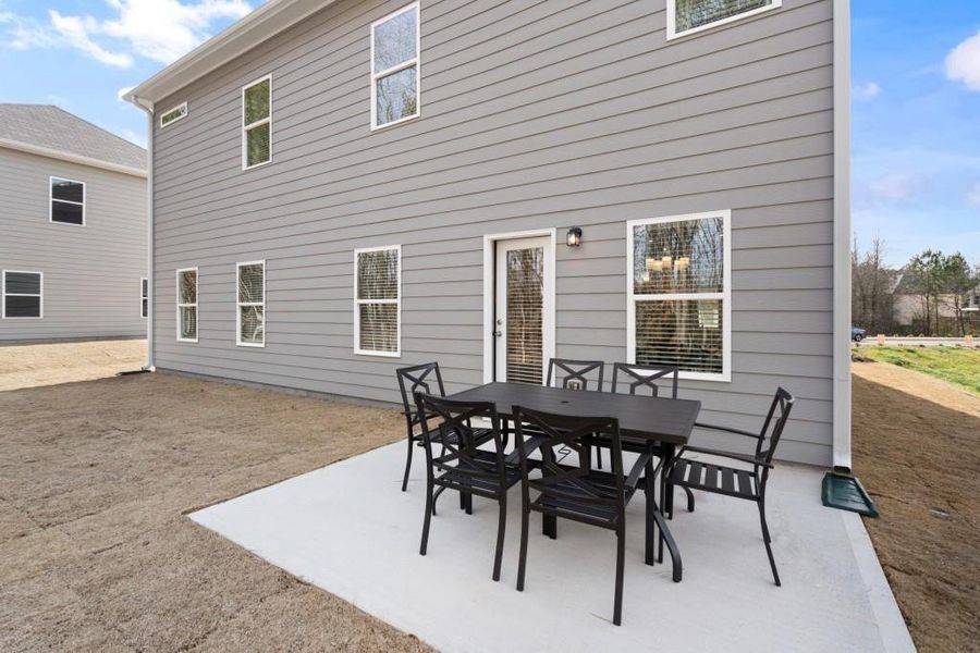 Exterior details and patio area of a home in Jones Ridge, Dallas (Image 2). Exterior details and patio area of a home in Jones Ridge, Dallas (Image 2).