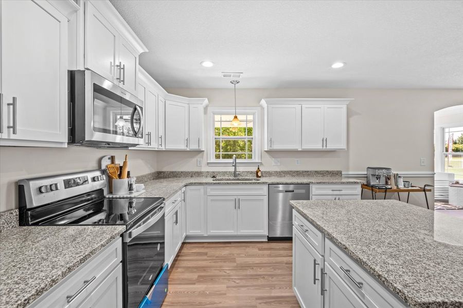 Representative furnished interior of a home built from the Fernwood by Enchanted Homes in Guadalupe Heights, Seguin (Image 18).
