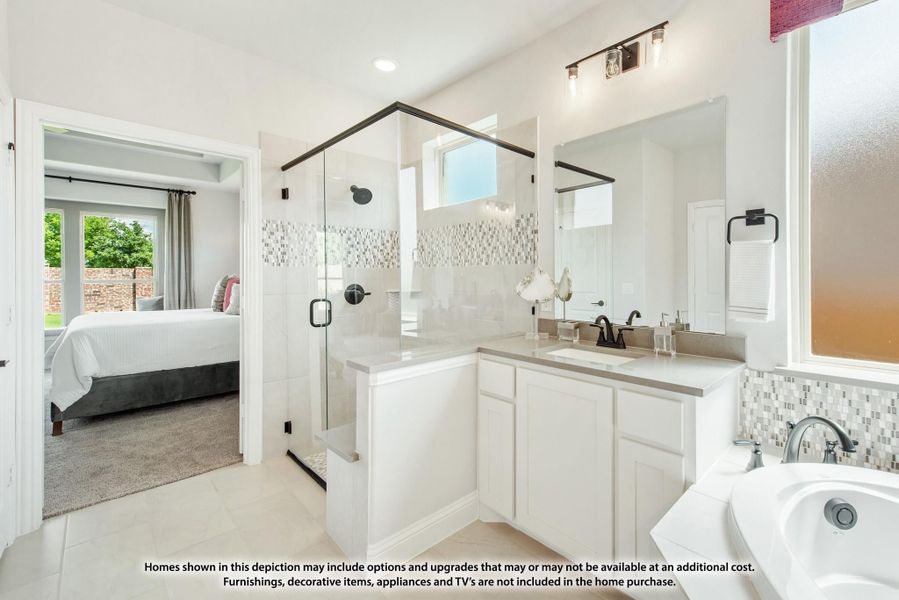 Master ensuite bathroom with glass walk-in shower, double vanity, soaking tub, and view into bedroom.