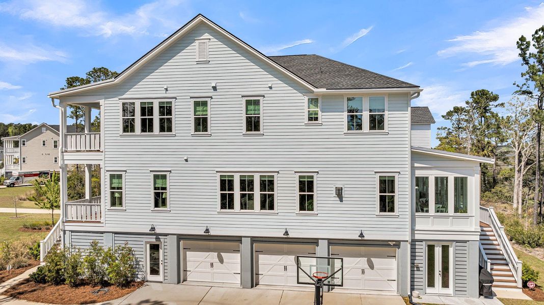 Front exterior of a new home in Carolina Park: Riverside, Mount Pleasant, SC, highlighting curb appeal (Image 25).