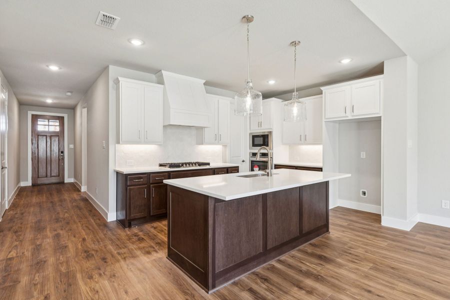Furnished interior view inside a new home in Painted Tree Woodland West, McKinney (Image 7).