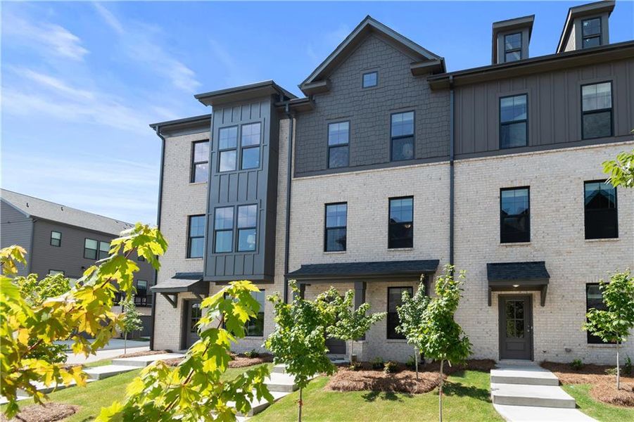 Front exterior of a new home in Silverock, McDonough, GA, highlighting curb appeal (Image 27).