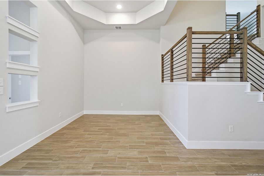 Spacious, unfurnished interior of a new home in The Woodlands at Medina Hills, Mico (Image 18).