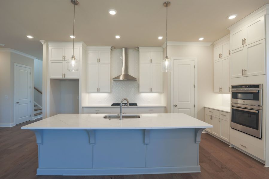Representative furnished interior of a home built from the The Bennett by The Providence Group in Aberdeen, Hoschton (Image 7).