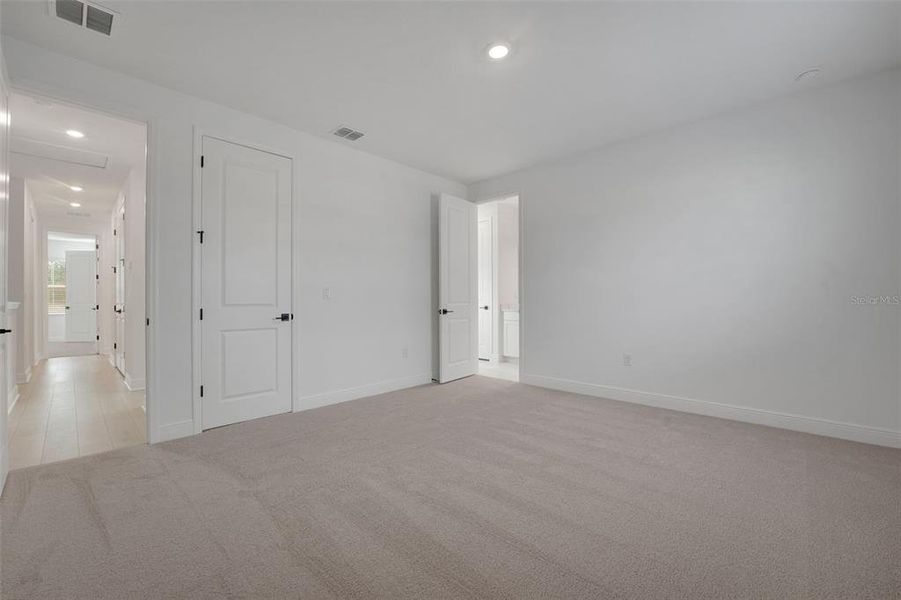 Spacious, unfurnished interior of a new home in Palms at Windermere, Windermere (Image 22).