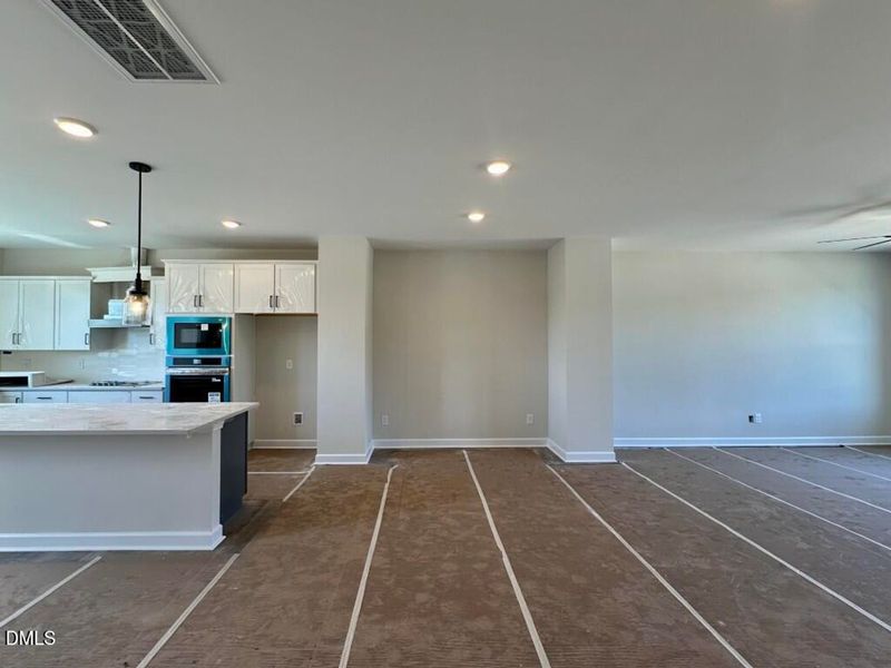 In-progress construction of a new home in Forestville Yard Townhomes, Knightdale, NC (Image 10).