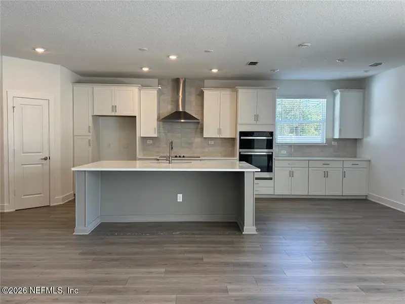 Furnished interior view inside a new home in Pirates Bluff, Yulee (Image 5).