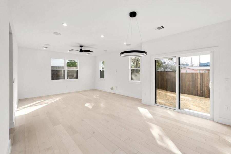 Unfurnished room with light wood-style floors, recessed lighting, and a ceiling fan