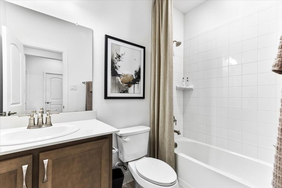 Furnished interior view inside a new home in The Reserve at Spiritas Ranch, Little Elm (Image 16).