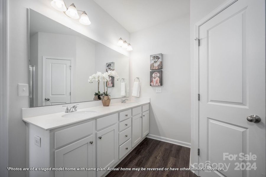 Primary bath with dual sinks and large shower