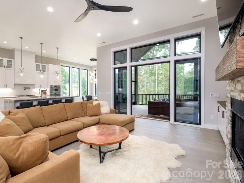 Great room opens into screened patio