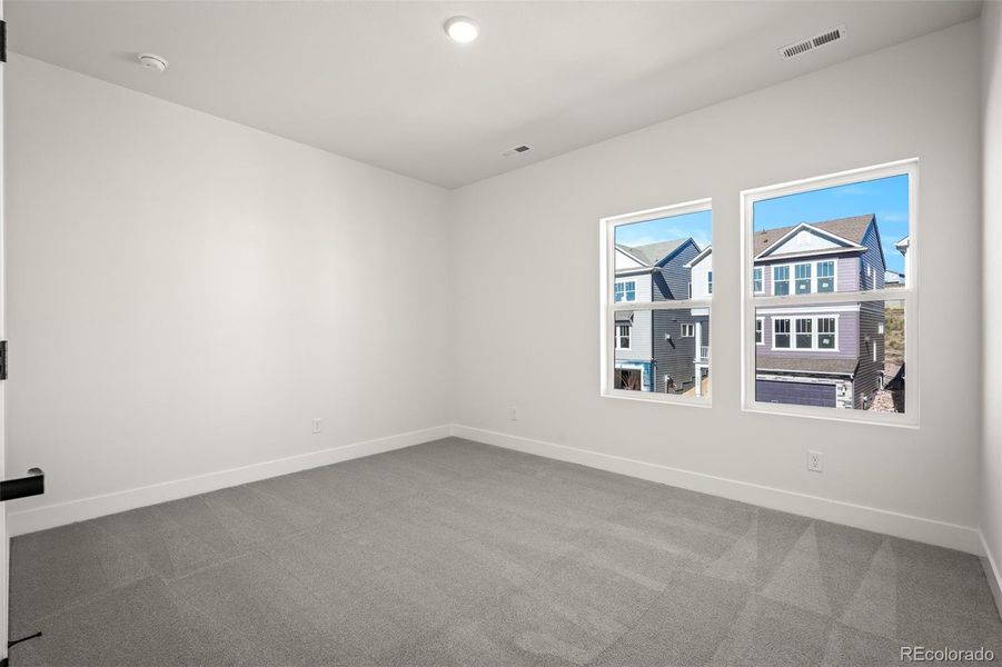 Spacious, unfurnished interior of a new home in Trailside at Cottonwood Creek, Colorado Springs (Image 29).