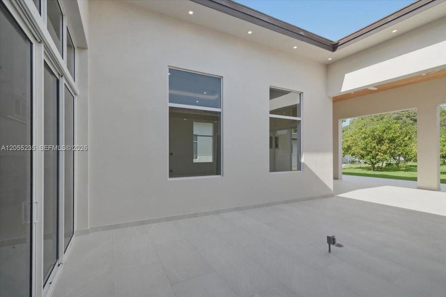 Exterior details and patio area of a home in , Miami (Image 39). Exterior details and patio area of a home in , Miami (Image 39).