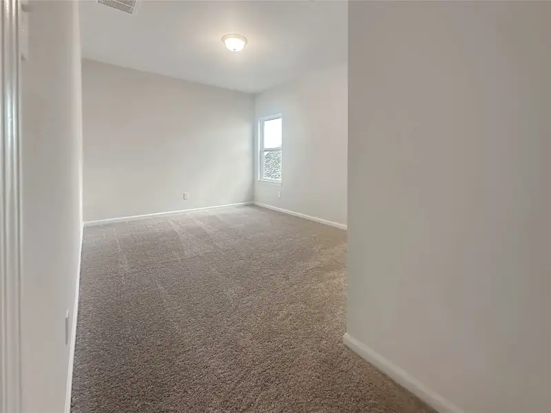 The Caldwell- Primary Bedroom. Home is under construction. Sample image for illustration; upgrades, options, and colors may vary.