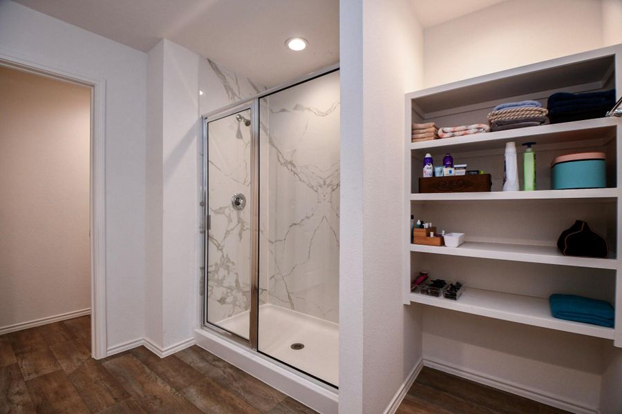 The space has a clean, contemporary feel with tile flooring for easy cleaning.