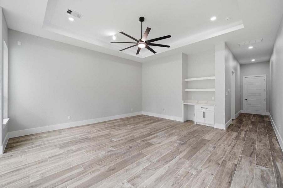 master bedroom with nice desk .