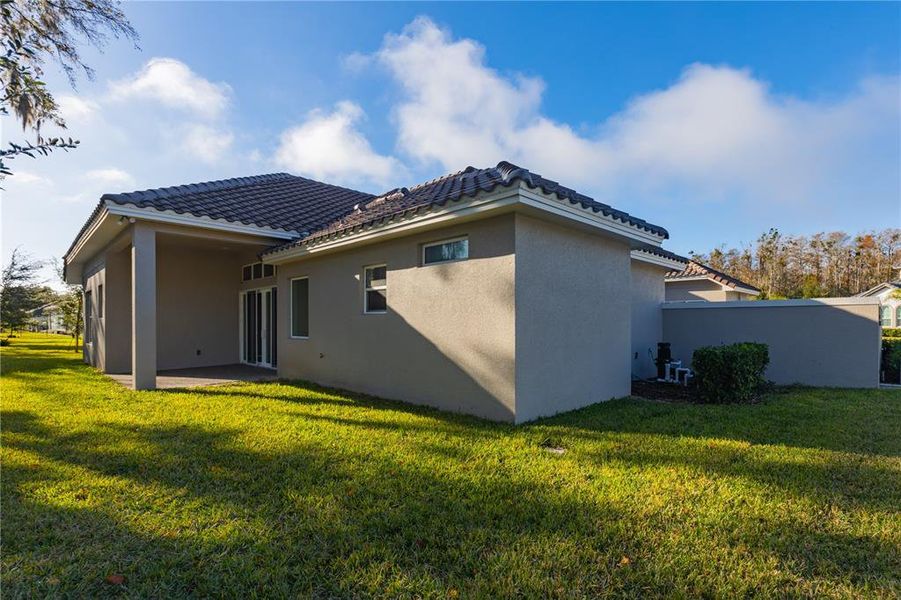 Exterior details and patio area of a home in Toscana, Palm Coast (Image 23).