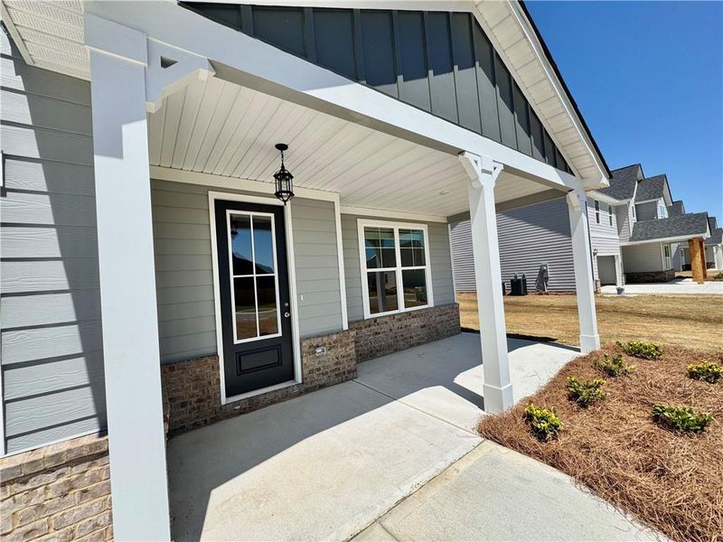 Exterior details and patio area of a home in , Gray (Image 3).