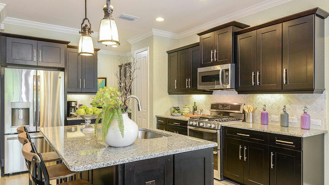 Furnished interior view inside a new home in SkySail Real Estate and Homes for Sale in Naples, FL - Neal Communities, Naples (Image 3).