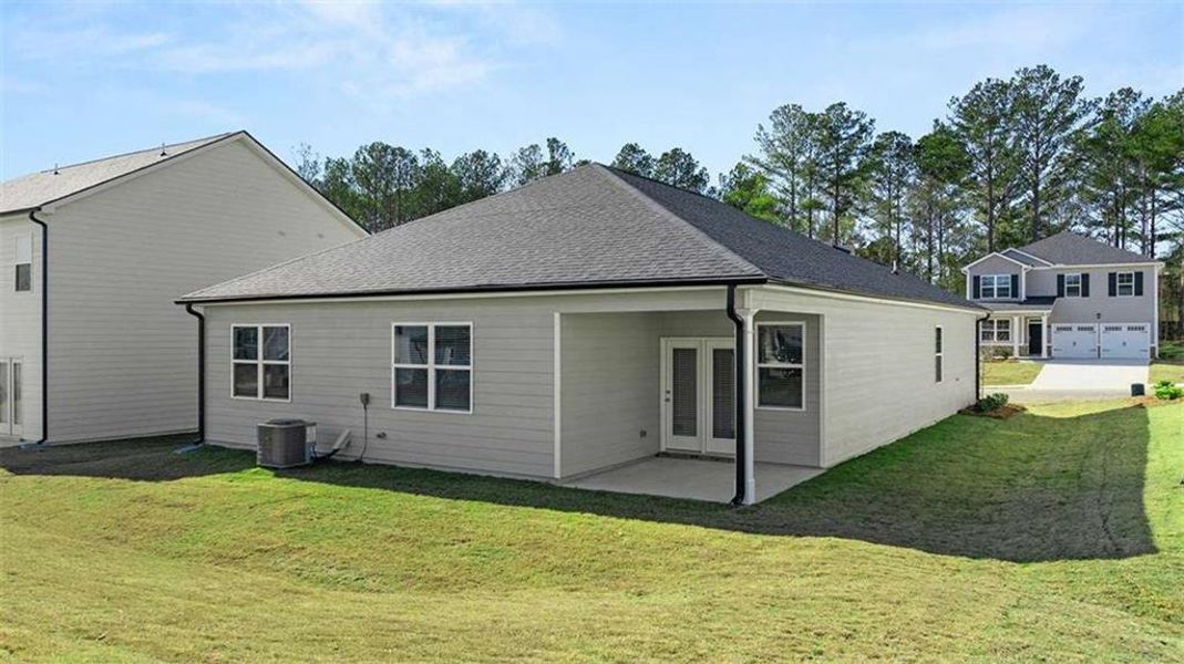 Exterior details and patio area of a home in Oakchase at Hampton, Hampton (Image 4). Exterior details and patio area of a home in Oakchase at Hampton, Hampton (Image 4).