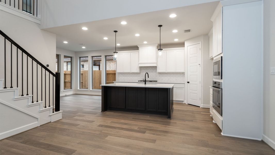 Furnished interior view inside a new home in Lakes of Cane Island, Katy (Image 4).