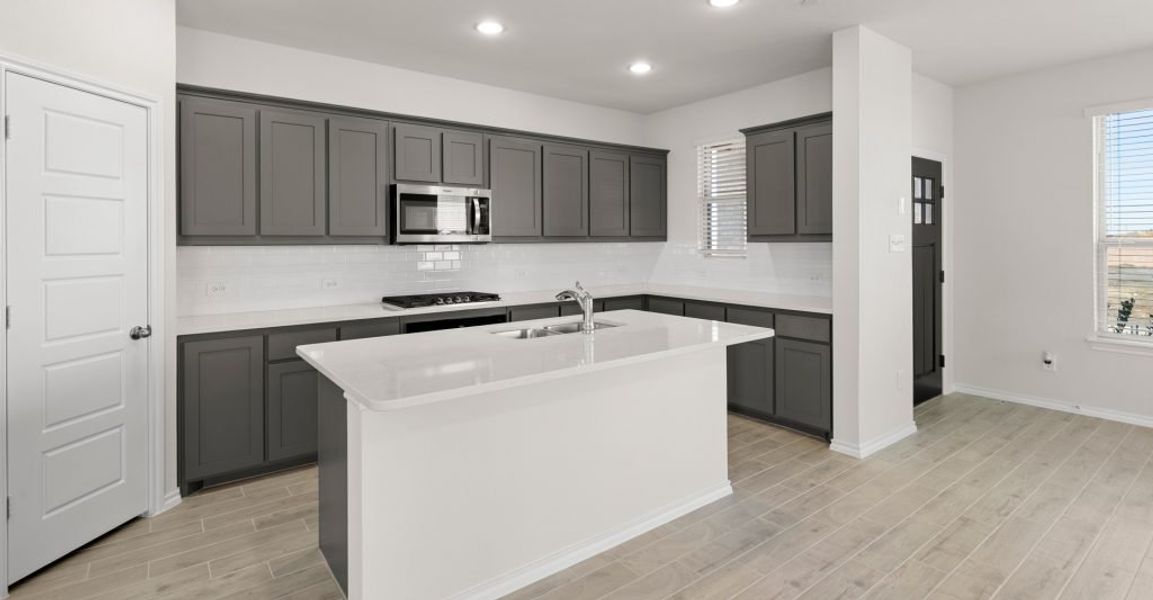 Representative exterior photo of a completed home built from the Caddo by Impression Homes in Creekshaw, Royse City, TX (Image 5).