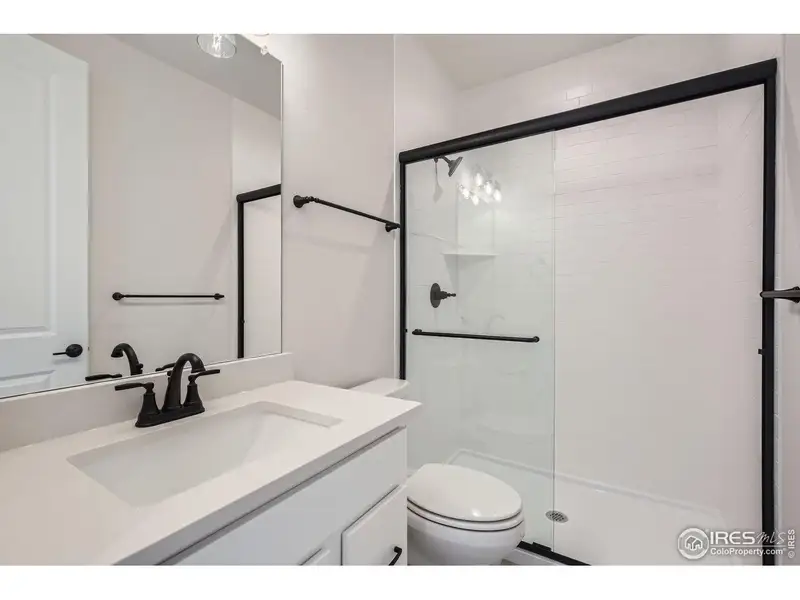 Furnished interior view inside a new home in RainDance, Windsor (Image 11).