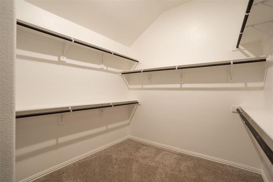 Large primary suite closet. Large primary suite closet.