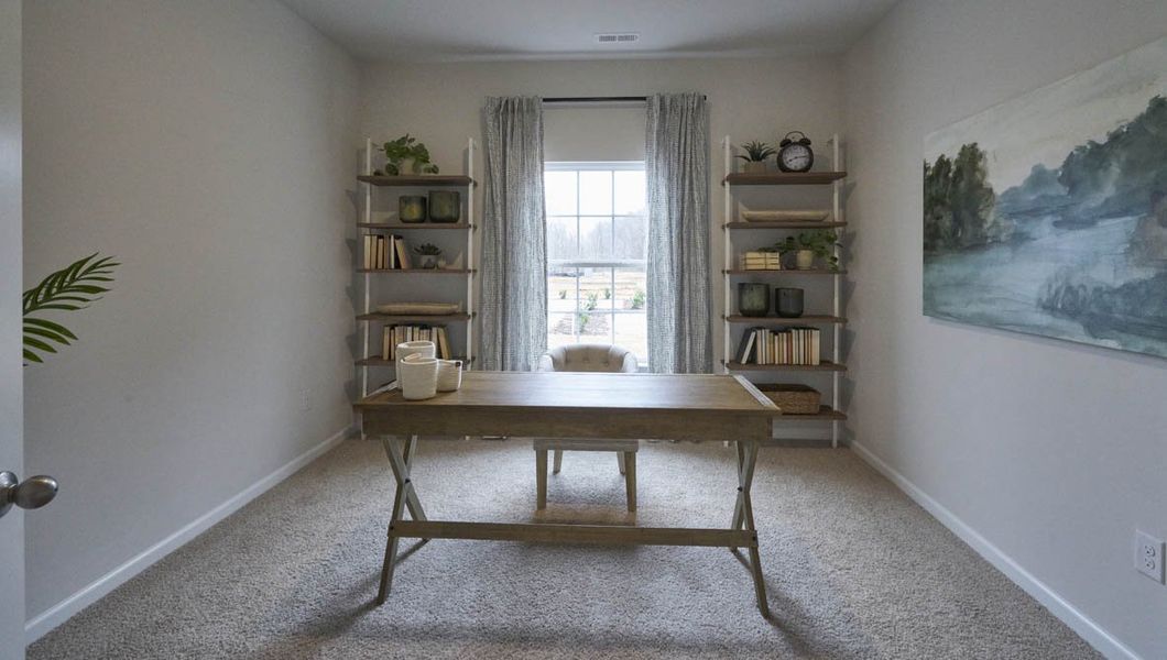 Representative furnished interior of a home built from the CALI by D.R. Horton in Raven Ridge, Lexington (Image 8).