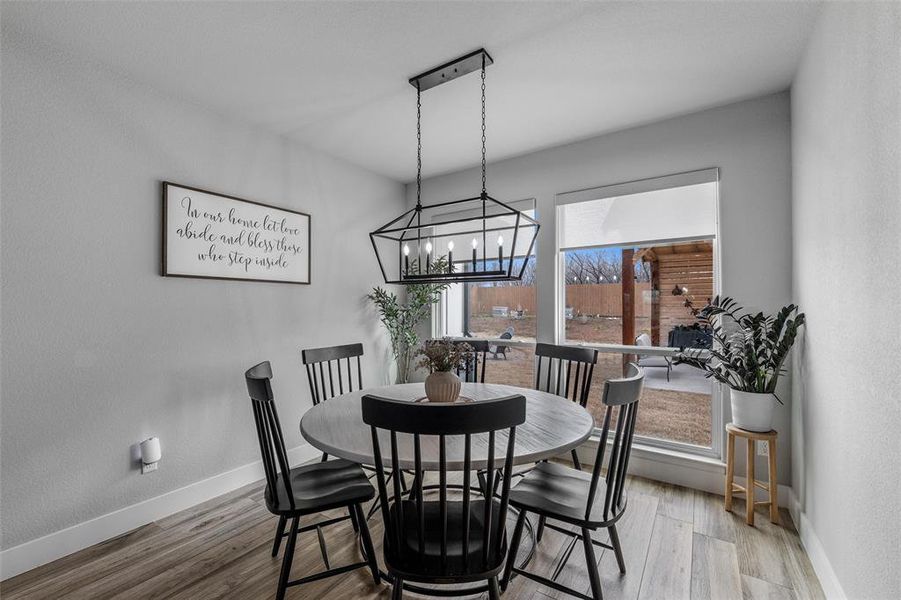 Dining area featuring hardwood / wood-style flooring