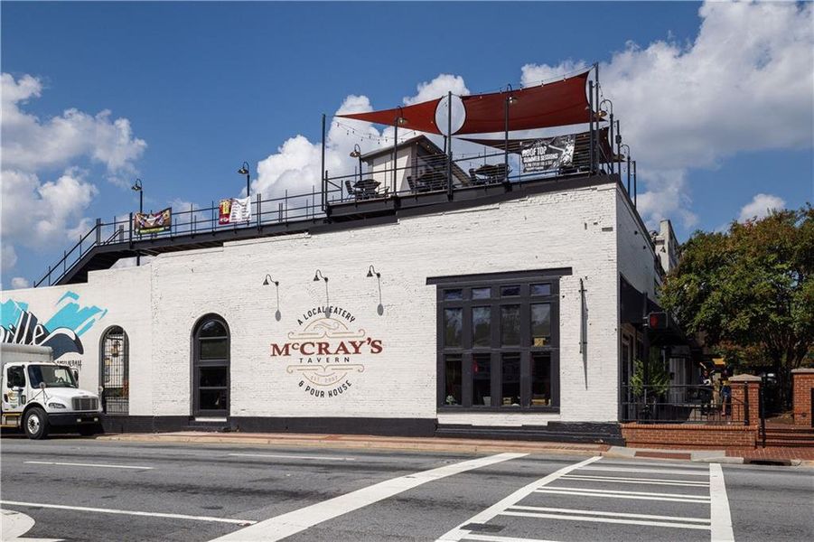 Front exterior of a new home in Rhodes Glen, Lawrenceville, GA, highlighting curb appeal (Image 2).
