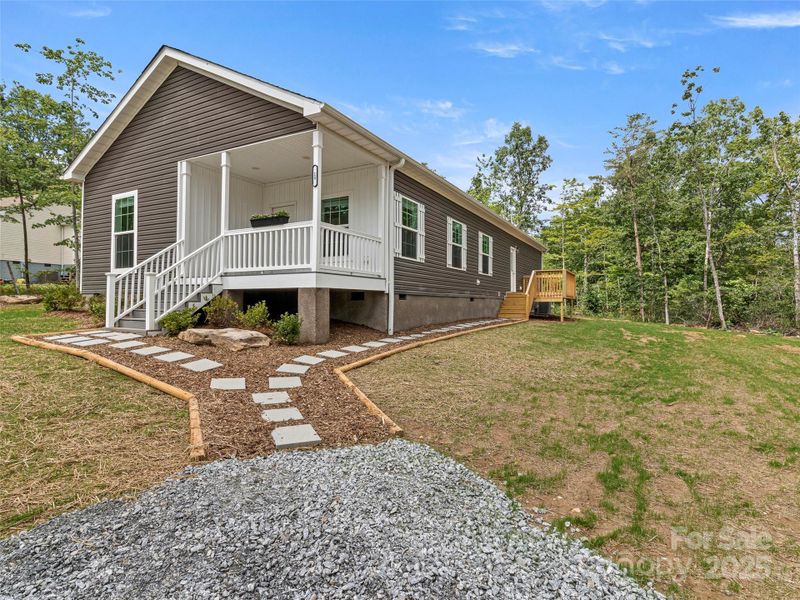 Front exterior of a new home in , Hendersonville, NC, highlighting curb appeal (Image 23).