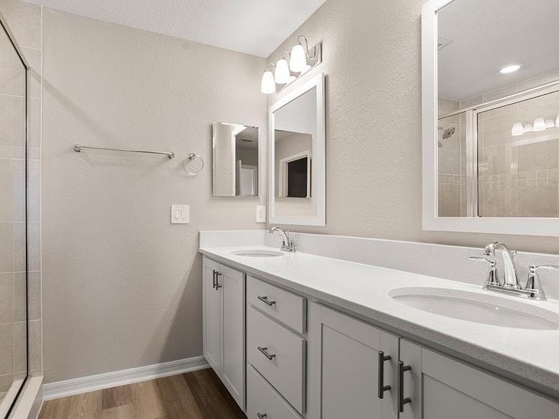Your suite is complete with a private en-suite bath - Brynn bungalow by Highland Homes