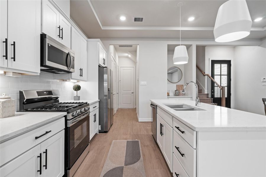 Smart layout with generous prep space and clear sightlines that make the entire first floor feel connected.