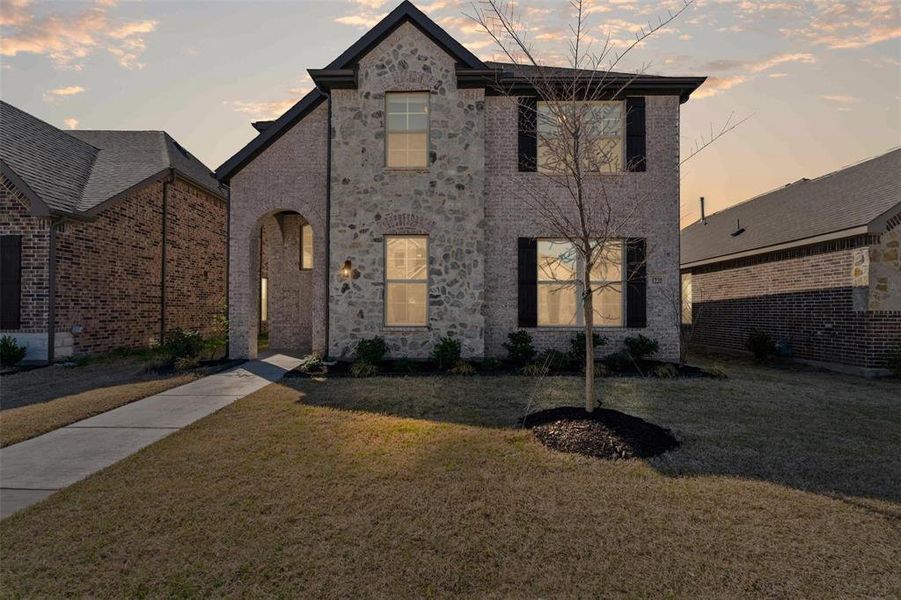 Front exterior of a new home in , Justin, TX, highlighting curb appeal (Image 20). Front exterior of a new home in , Justin, TX, highlighting curb appeal (Image 20).