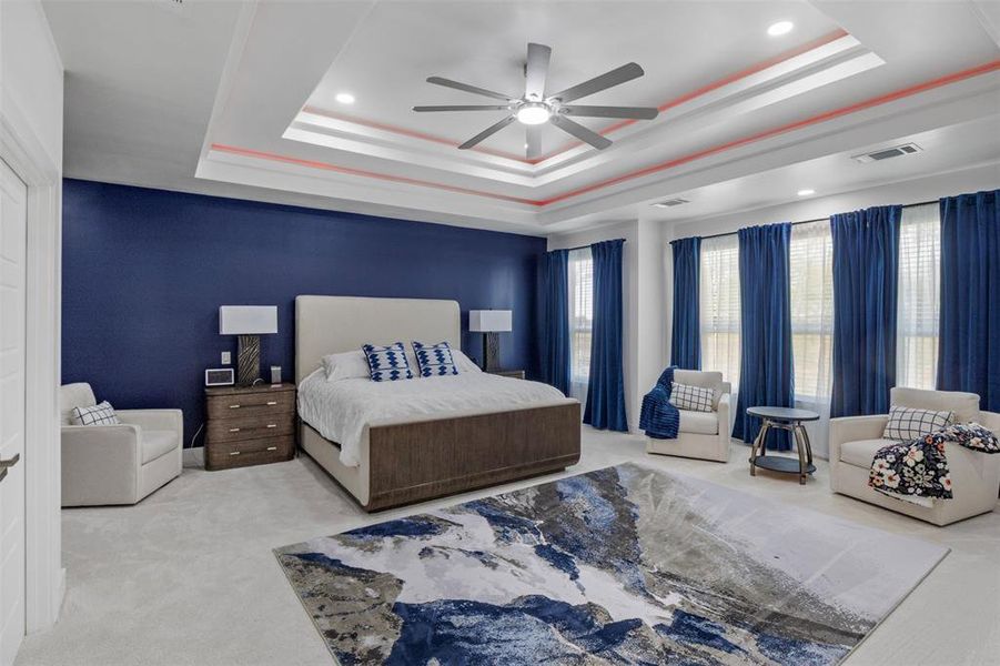 Bedroom with ceiling fan, light carpet, and recessed lighting Bedroom with ceiling fan, light carpet, and recessed lighting