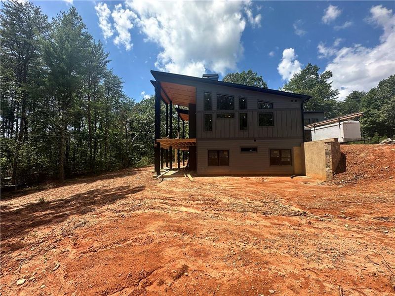 Front exterior of a new home in , Morganton, GA, highlighting curb appeal (Image 11).