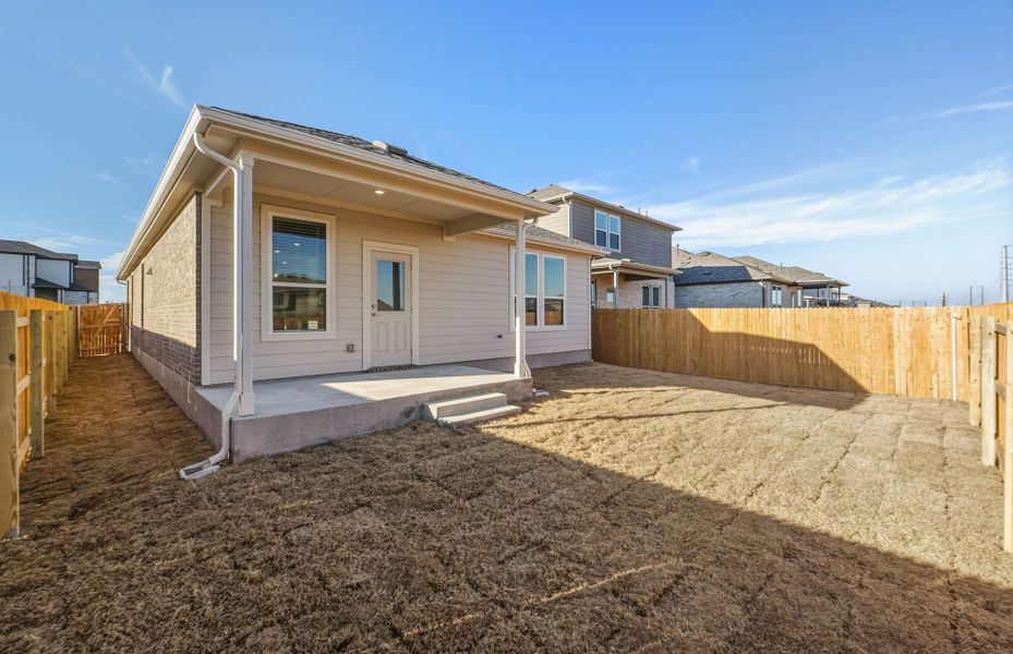 Exterior details and patio area of a home in Crosswinds, Kyle (Image 4).
