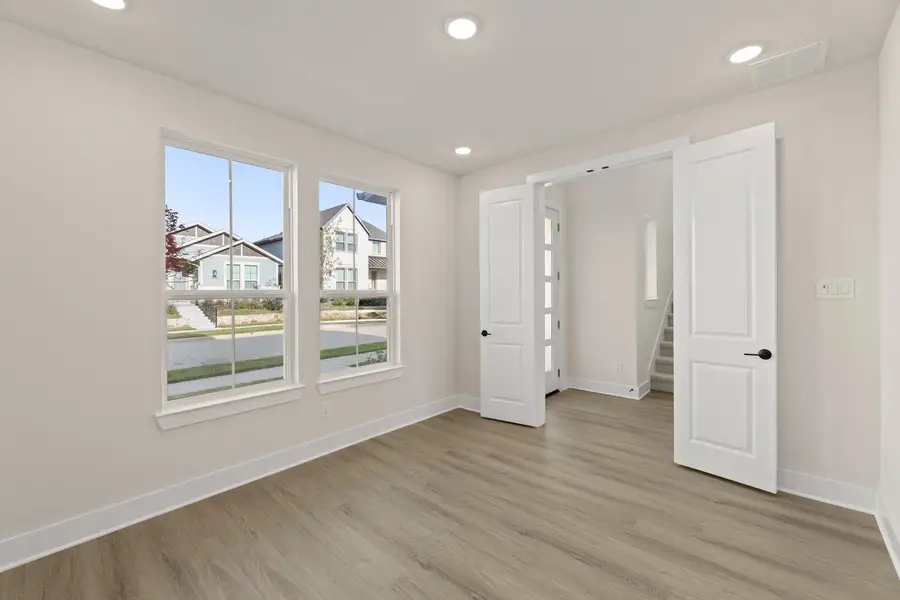 Spacious, unfurnished interior of a new home in Carriage Collection at Painted Tree, McKinney (Image 14).