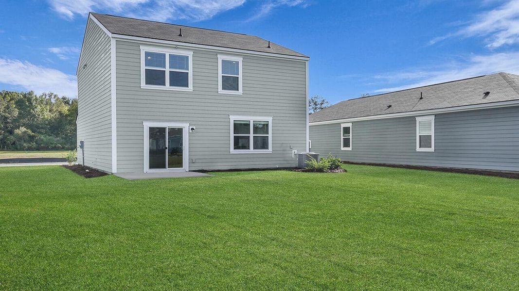 Exterior details and patio area of a home in The Oaks at Center Station, Hollywood (Image 3).