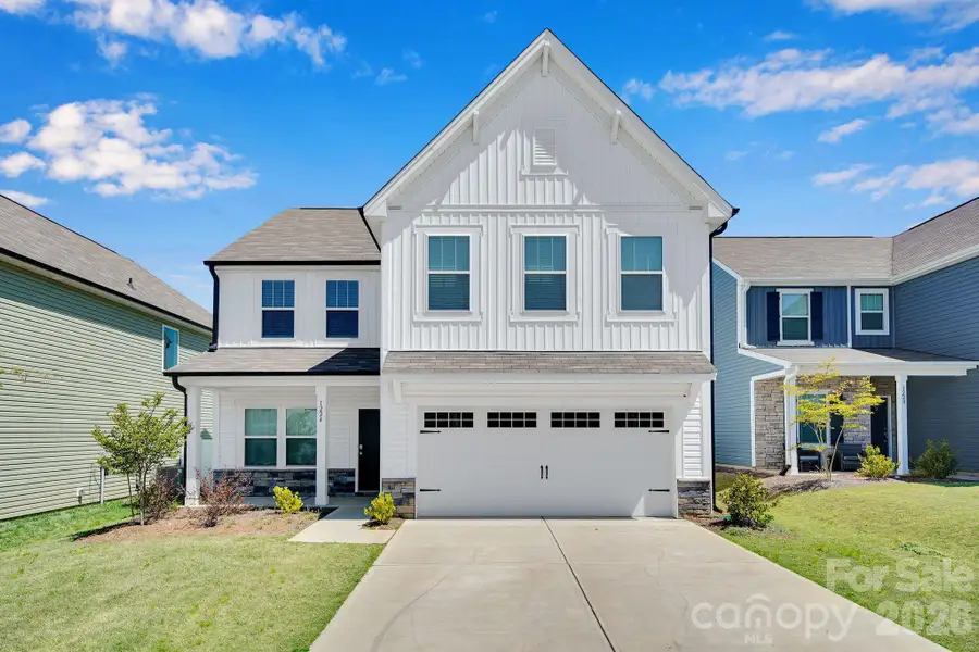 Front exterior of a new home in , Dallas, NC, highlighting curb appeal (Image 1). Front exterior of a new home in , Dallas, NC, highlighting curb appeal (Image 1).