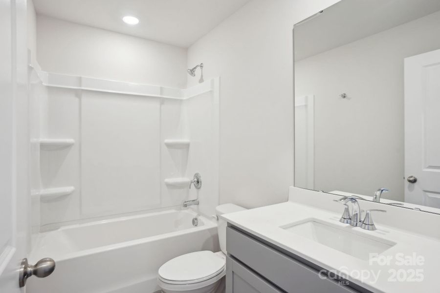 Photo is not of the actual home, but is an inspirational photo of builder’s model home and may depict options, furnishings, and/or decorator features that are not included