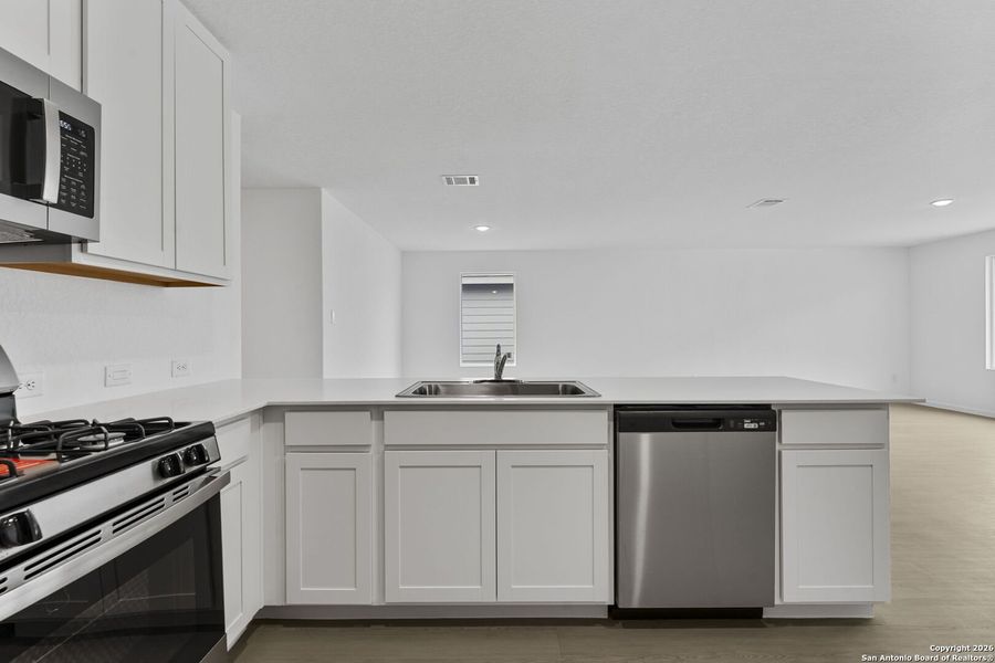Furnished interior view inside a new home in Voss Farms, New Braunfels (Image 7).