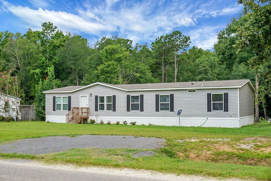 Front exterior of a new home in , Bonneau, SC, highlighting curb appeal (Image 27).