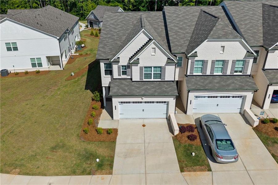 Front exterior of a new home in , Duluth, GA, highlighting curb appeal (Image 21).