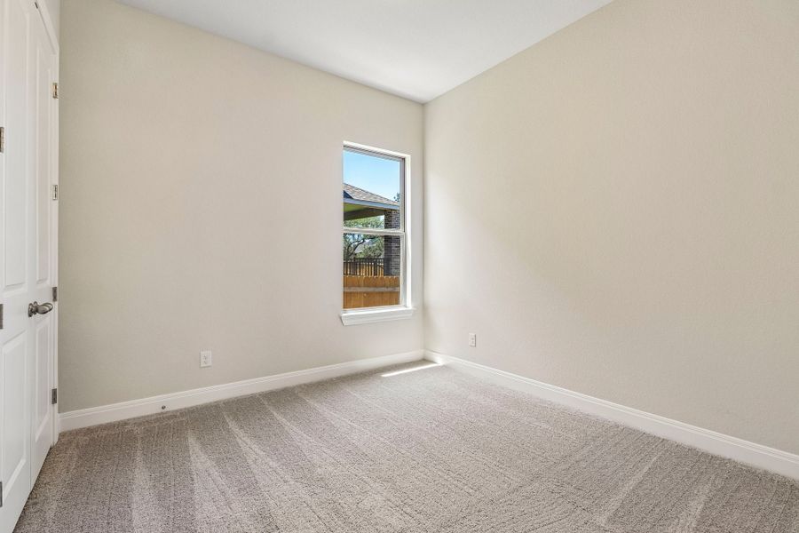 Representative unfurnished interior of a home built from the Hamilton by Risewell Homes in 6 Creeks, Kyle (Image 13).