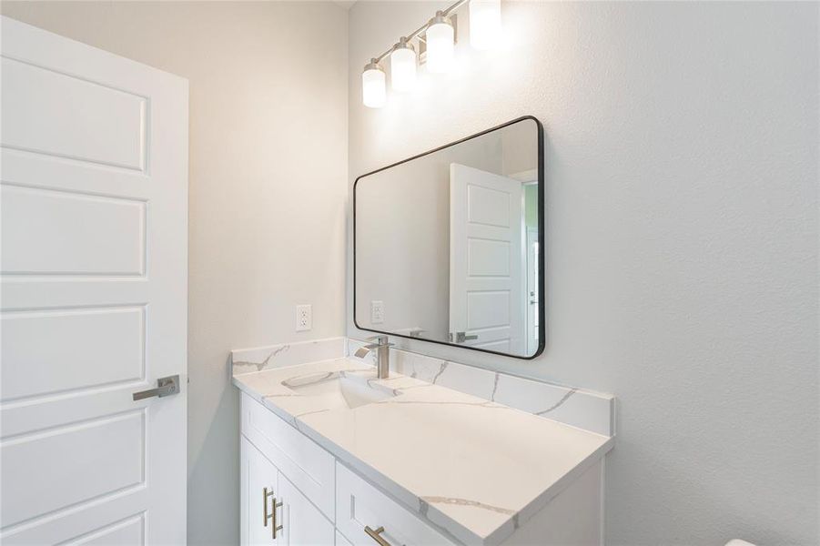 Bathroom featuring vanity